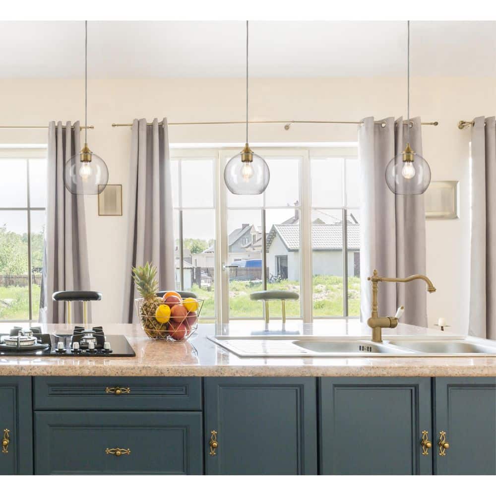 Tatze Brushed Brass Mini Pendant with Seeded Glass Globe