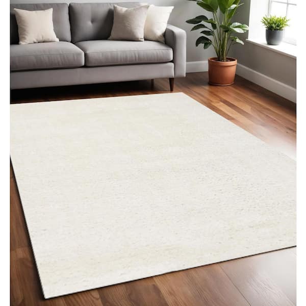 Cream 5 ft. x 8 ft. Woven Solid Color Rectangle Indoor Area Rug