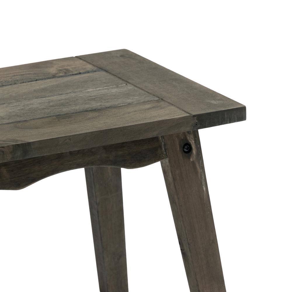 Close-up of the wood grain and joints on a side table.