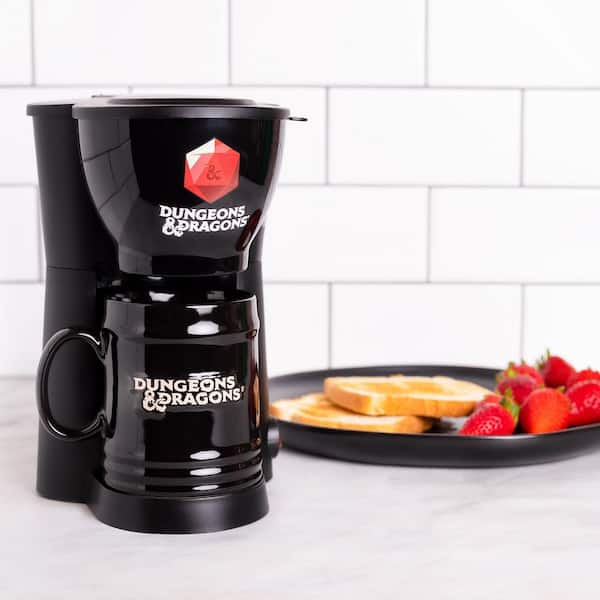 https://images.thdstatic.com/productImages/76b68295-2a66-489c-b80a-e16d27429525/svn/black-uncanny-brands-drip-coffee-makers-cm-dad-st1-31_600.jpg