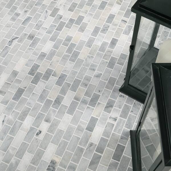 Carrara Classique Brick 11.81 in. x 11.81 in. Honed Marble Wall Tile (9.7 sq. ft./Case) Carrara Classique Brick 11.81 in. x 11.81 in. Honed Marble Wall Tile (9.7 sq. ft./Case)