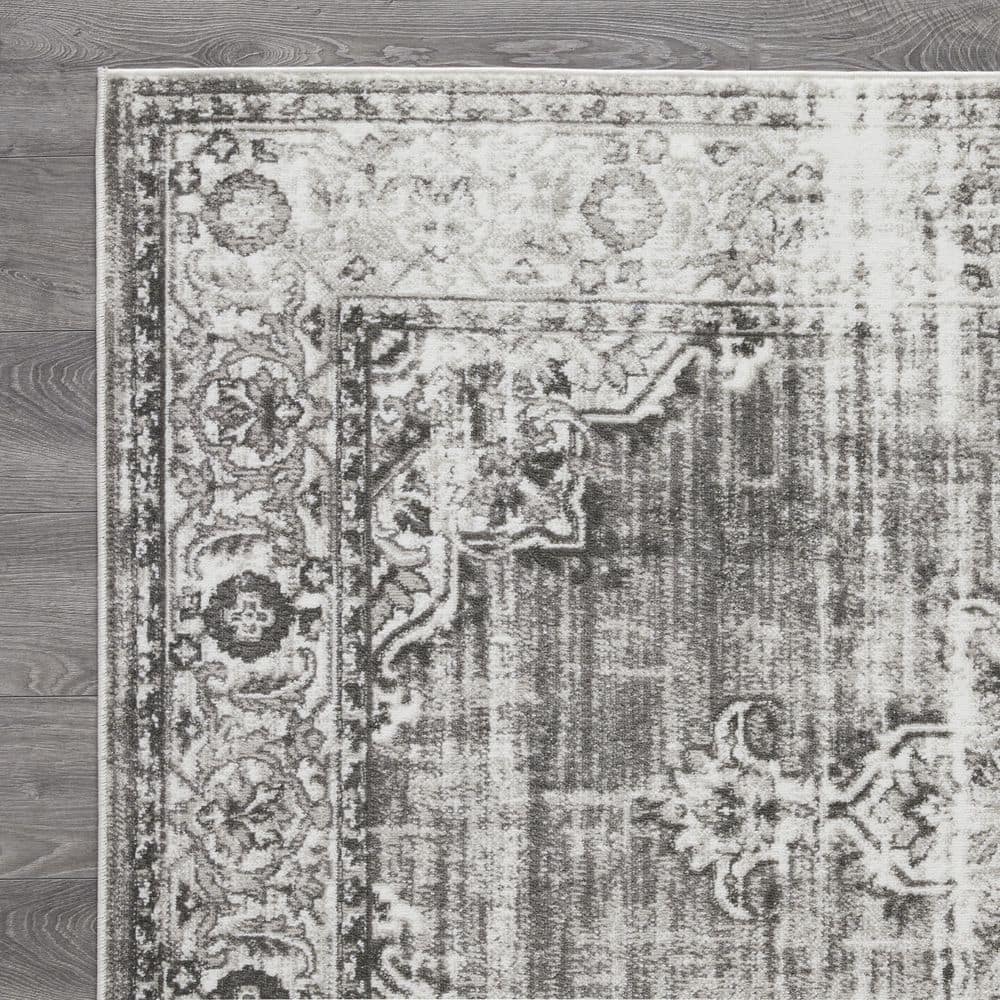 Ivory and Gray 9' x 12' Synthetic Oriental Rug