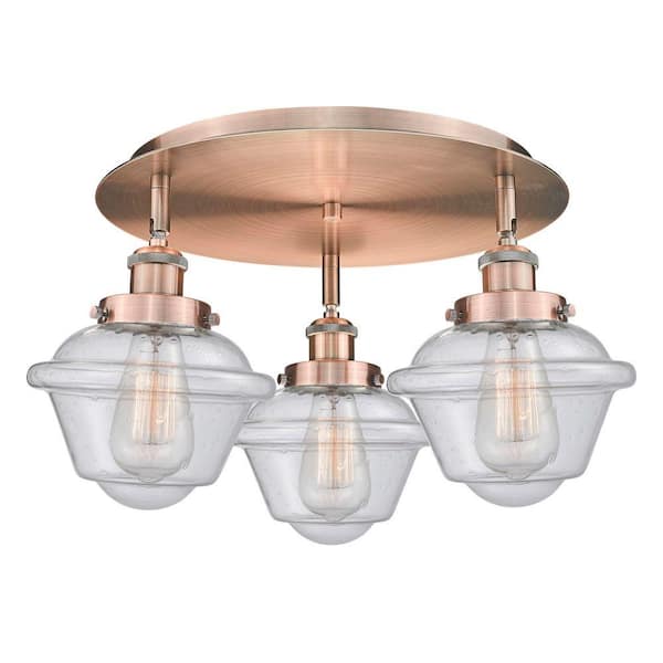 Oxford 18.25 in. 3-Light Antique Copper Art Nouveau Flush Mount with Seeded Glass Shade