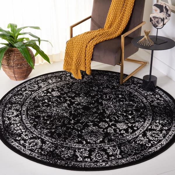 Adirondack Black/Ivory 4 ft. x 4 ft. Border Distressed Round Area Rug