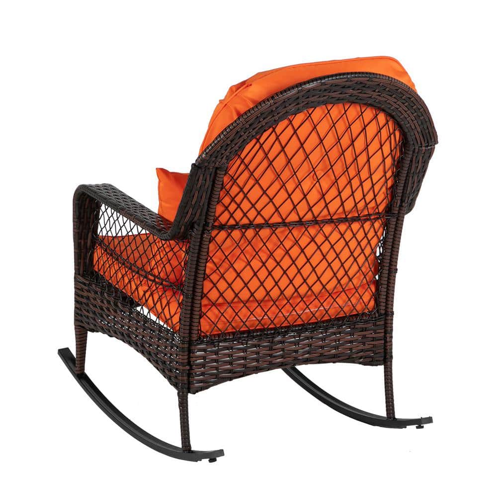 Brown Wicker Outdoor Rocking Chair with Orange Cushions