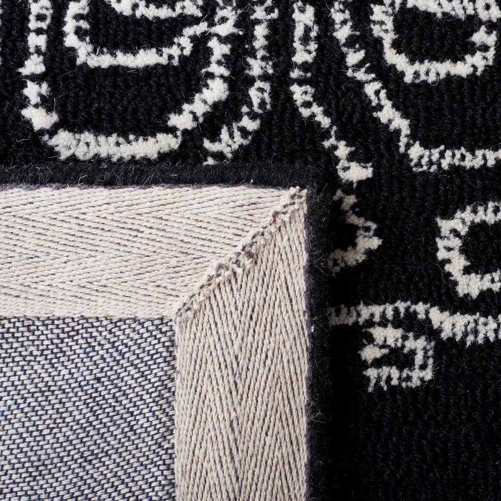 Black and Ivory Floral Hand-Tufted Wool 6' x 9' Area Rug