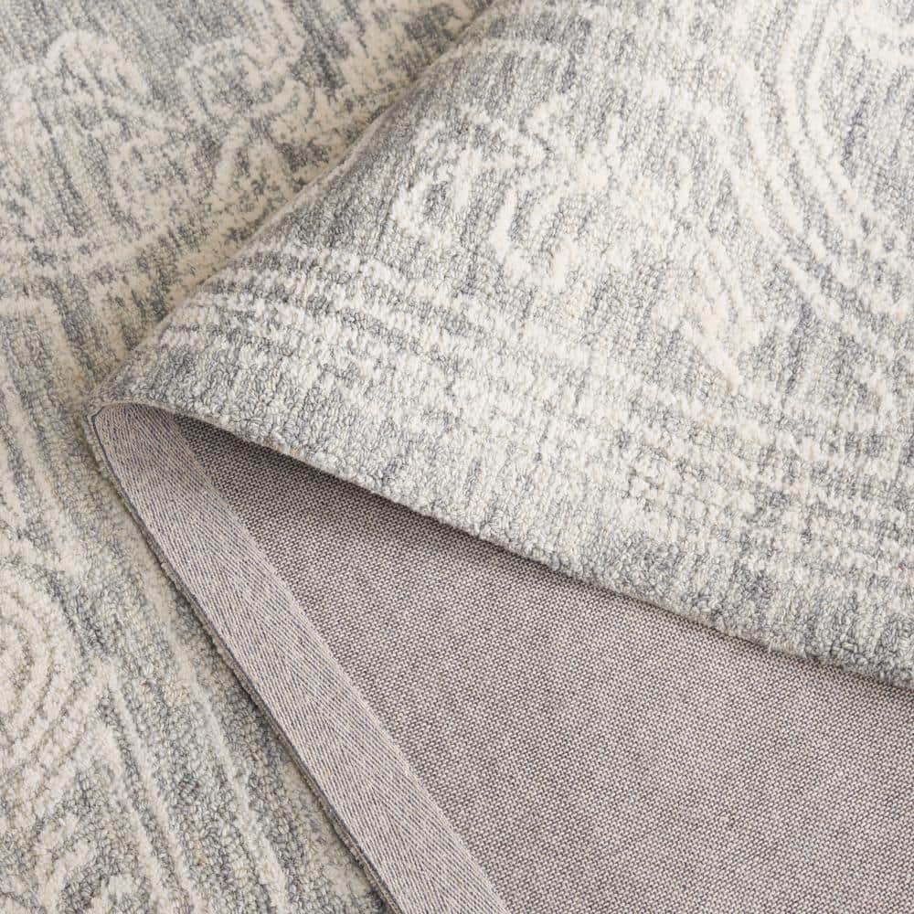 Ivory and Grey Hand Tufted Wool 4' x 6' Area Rug
