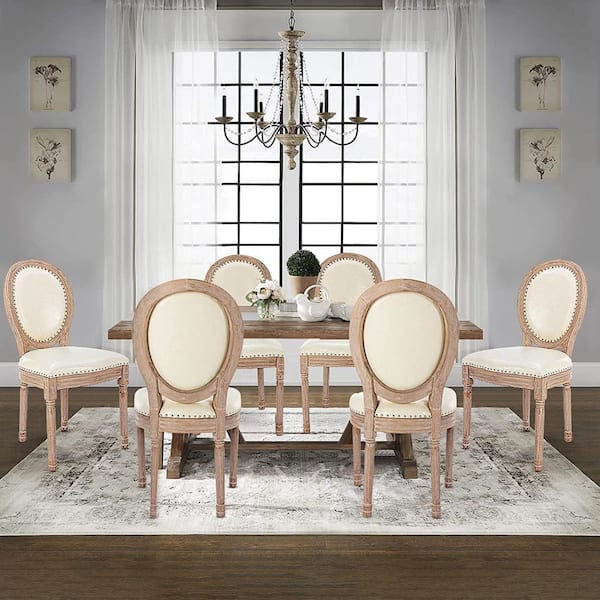 Baxton Studio Louis Traditional French Inspired Beige Faux Leather Upholstered and Black Finished Wood 2-Piece Dining Chair Set