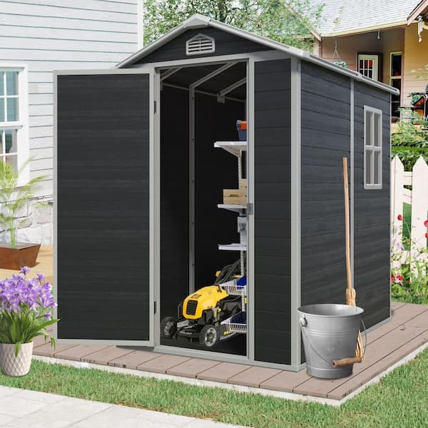 Unbranded - Outdoor 4 ft. W x 6 ft. D Resin Storage Shed with Floor, Window and Lockable Door Black (24 sq. ft. )