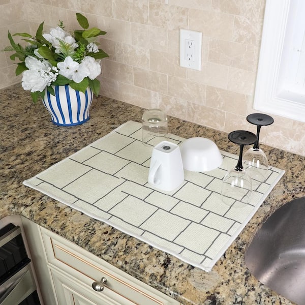 https://images.thdstatic.com/productImages/7725870c-bf6e-4b6c-8015-1a5c8dd28ac0/svn/beige-cream-sussexhome-sink-mats-dry-wlt-01-e1_600.jpg