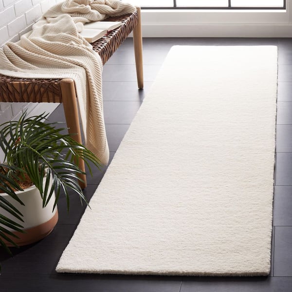 Fifth Avenue 2 ft. x 9 ft. Ivory Solid Runner Rug