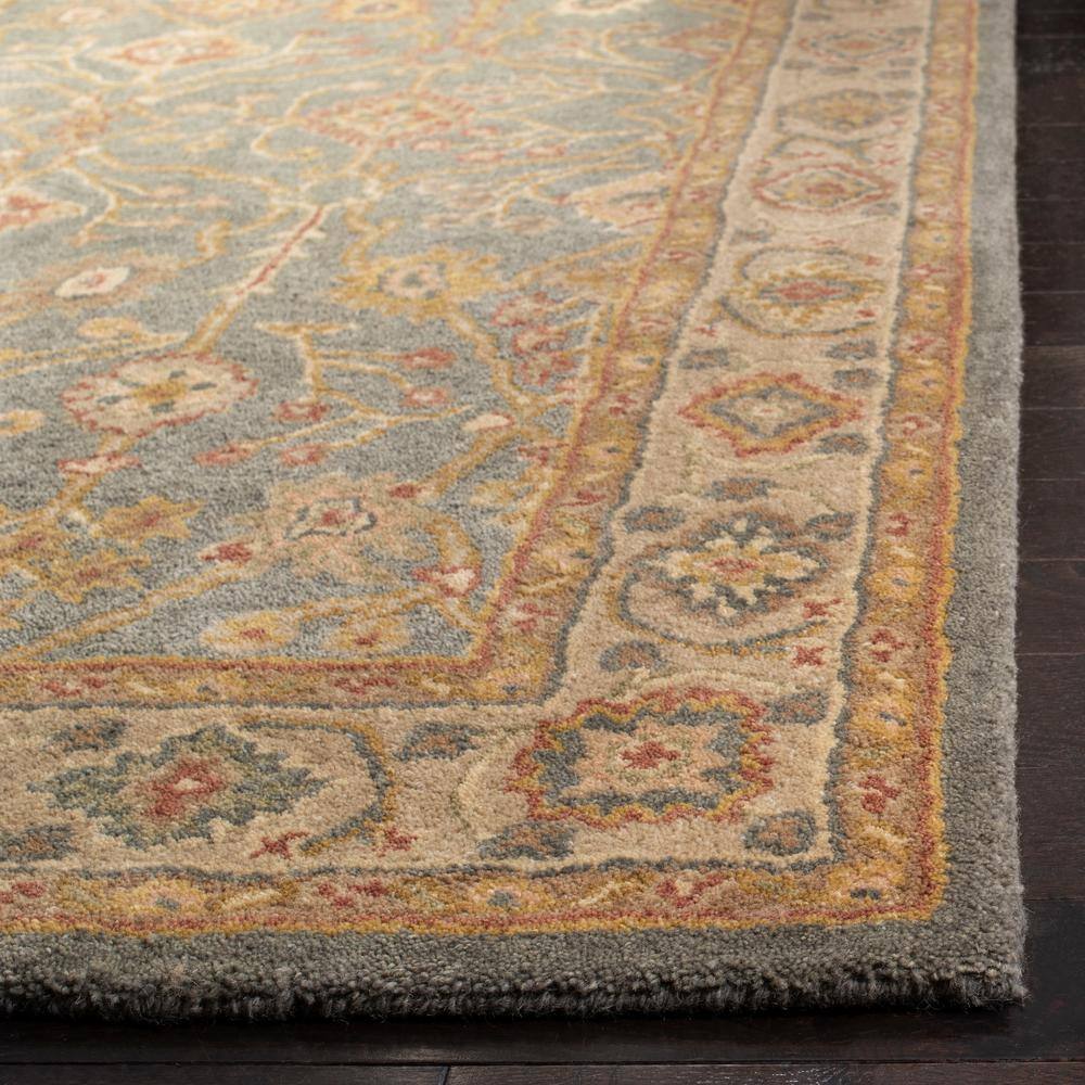 Handmade Blue and Ivory Tufted Wool Area Rug
