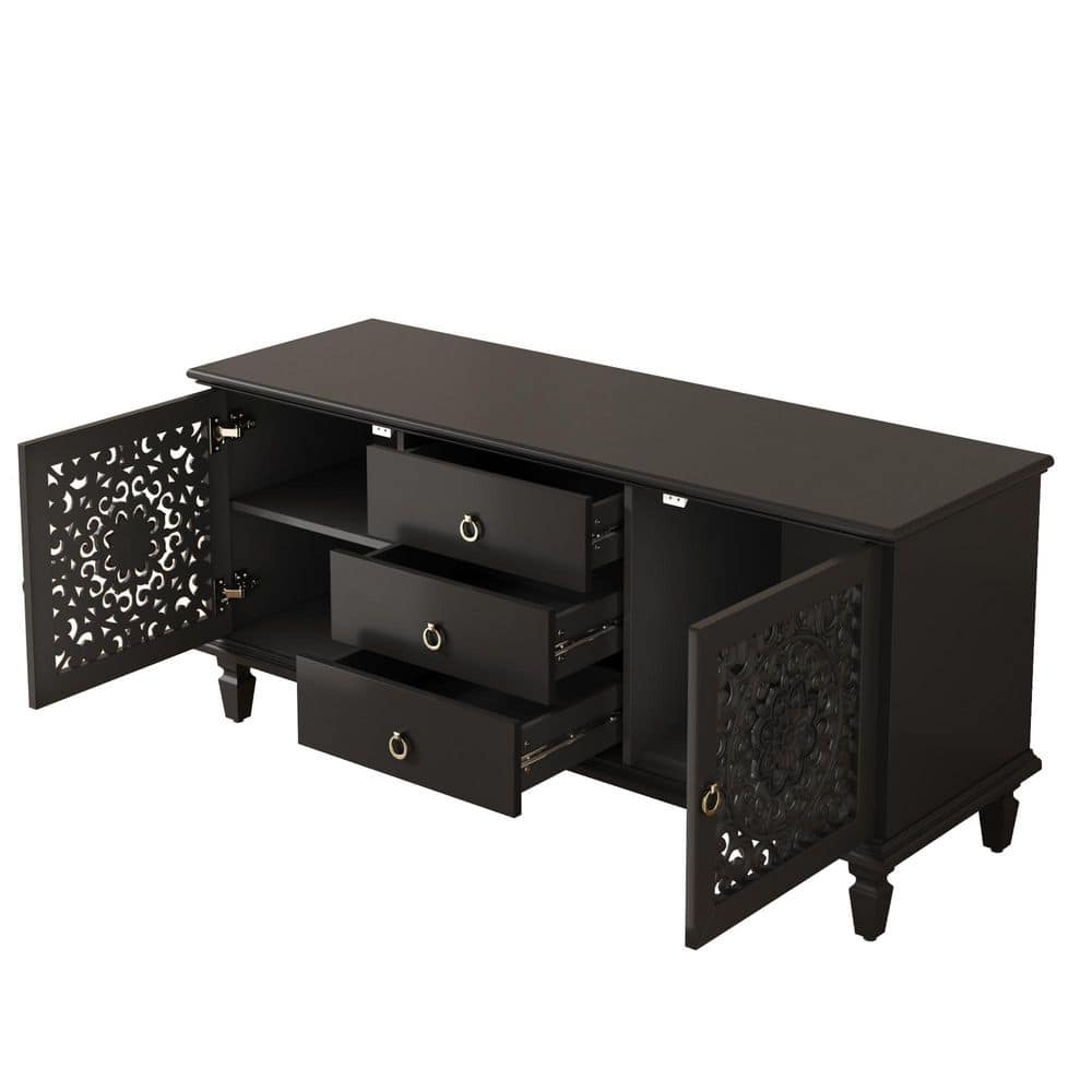 Side view of the black wood sideboard with open shelves.