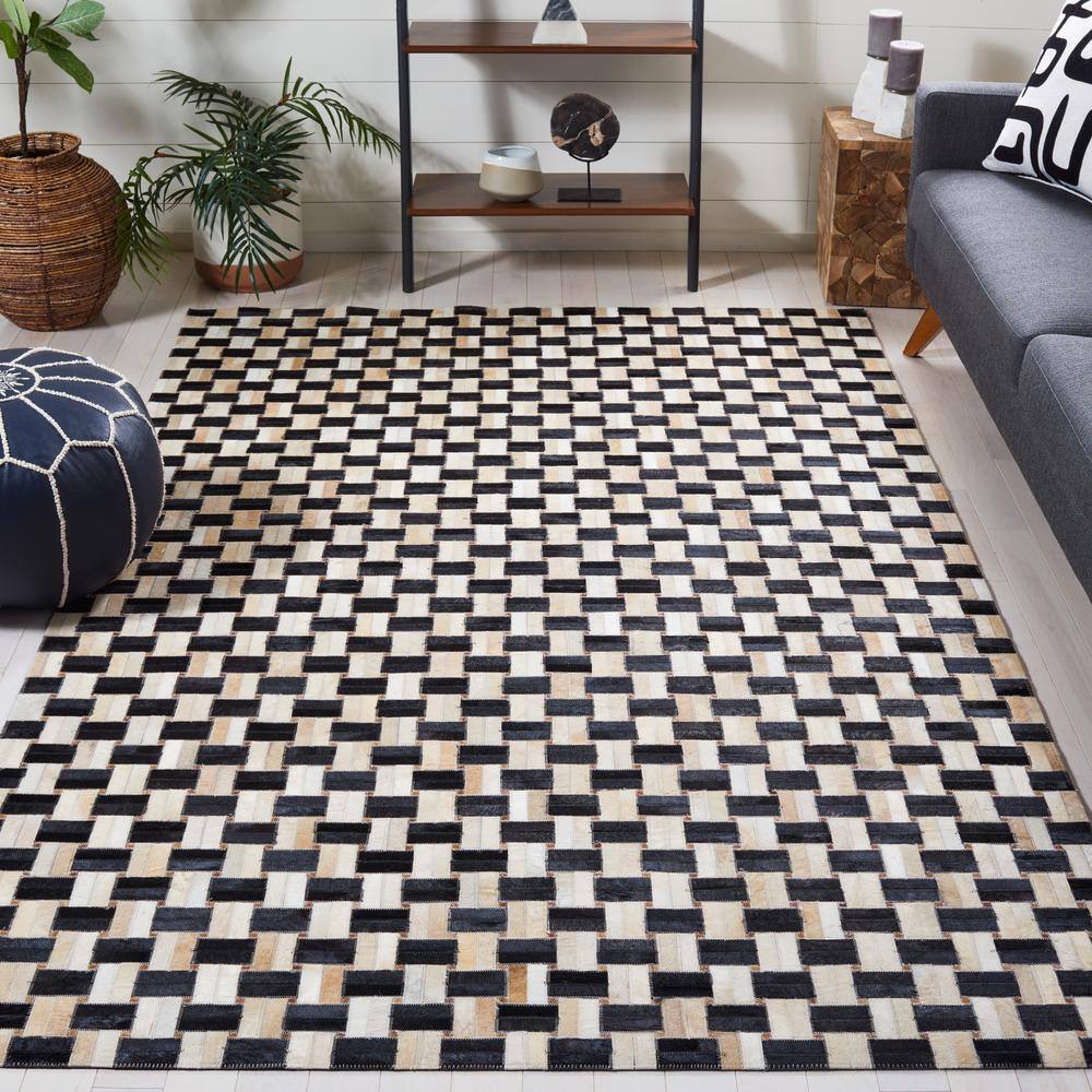 Black and Ivory Geometric Cowhide Area Rug