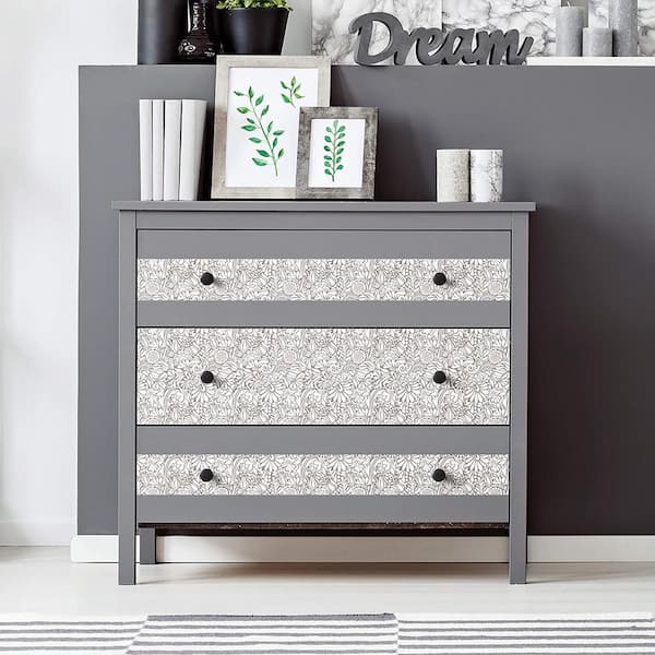 https://images.thdstatic.com/productImages/776f95bf-eb0a-4037-8023-4a60bf44a305/svn/taupe-and-white-con-tact-shelf-liners-drawer-liners-16f-c9a242-06-c3_600.jpg