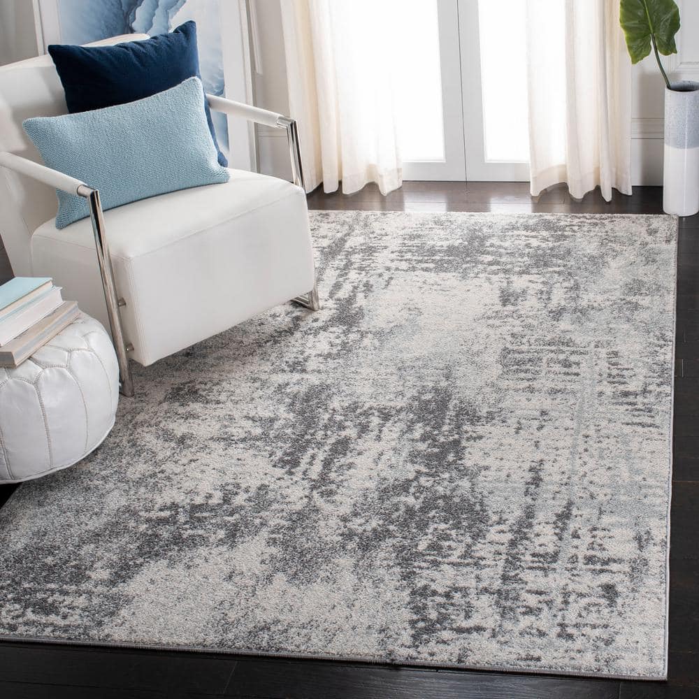 Ivory Abstract 4' x 6' Reversible Synthetic Area Rug
