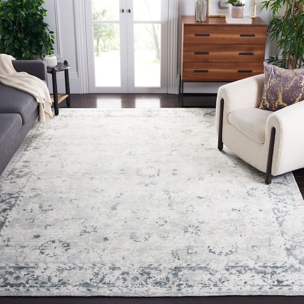 Mirage 9 ft. x 12 ft. Gray/Teal Distressed Border Area Rug