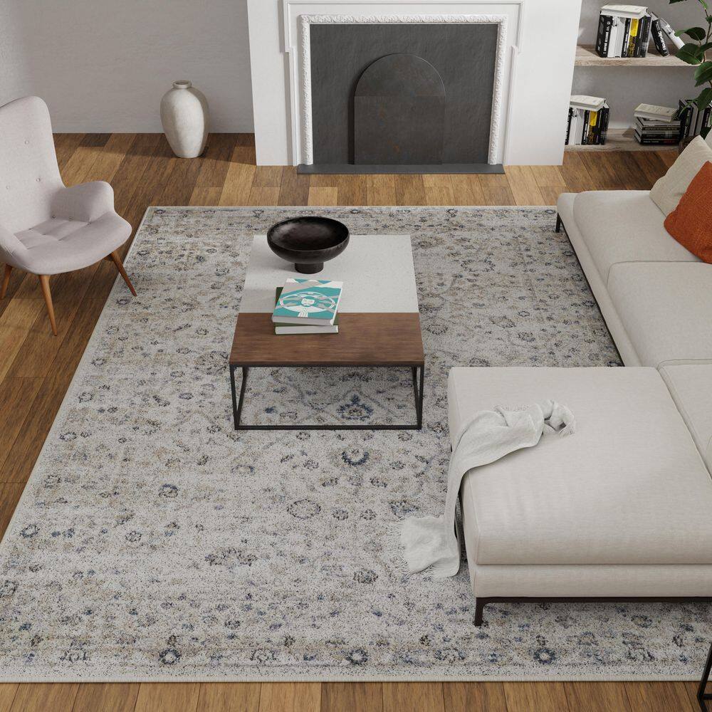 Blue Blossom Border 9' x 12' Synthetic Easy-Care Area Rug