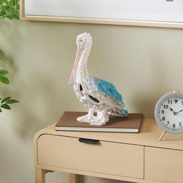 Litton Lane 10 in. x 14 in. Blue Polystone Textured Pelican Sculpture with Blue Feathers