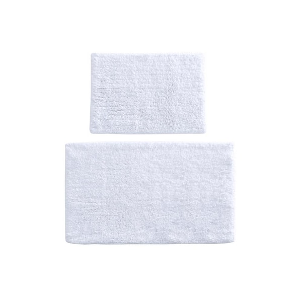 https://images.thdstatic.com/productImages/779ae6e0-2bb0-499f-ad8b-318bd407bec8/svn/white-madison-park-signature-bathroom-rugs-bath-mats-mps72-451-fa_600.jpg