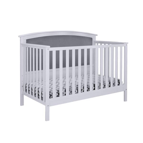grey tufted crib