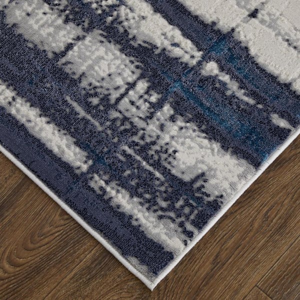 Ivory,  Blue 9 ft. x 12 ft. Loomed Abstract Polyester Indoor Area Rug