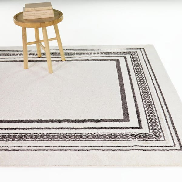 Porter Cream 8 ft. x 10 ft. Border Area Rug