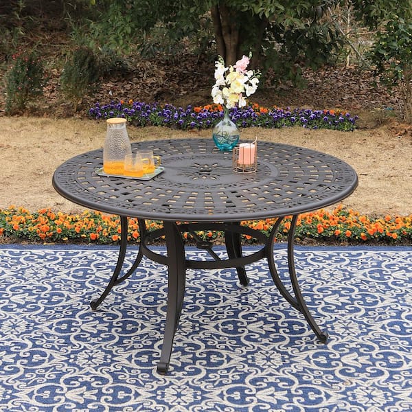 Round cast aluminum discount patio table set