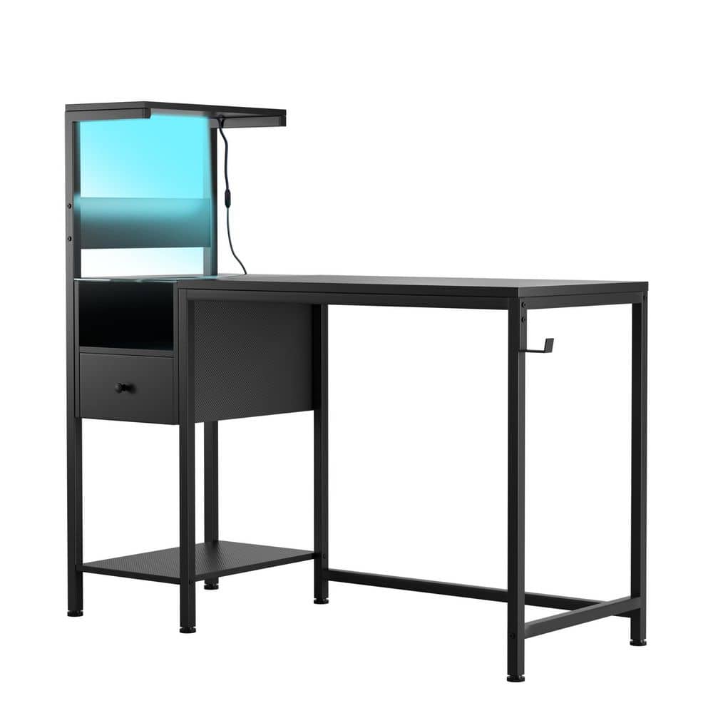 Black desk with blue glass side panel.