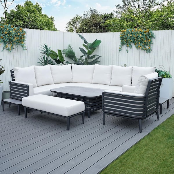 DIRECT WICKER Right Dark Grey 7-Piece Aluminum Patio Conversation Set with Beige Cushions, a Single Sofa and a Bench