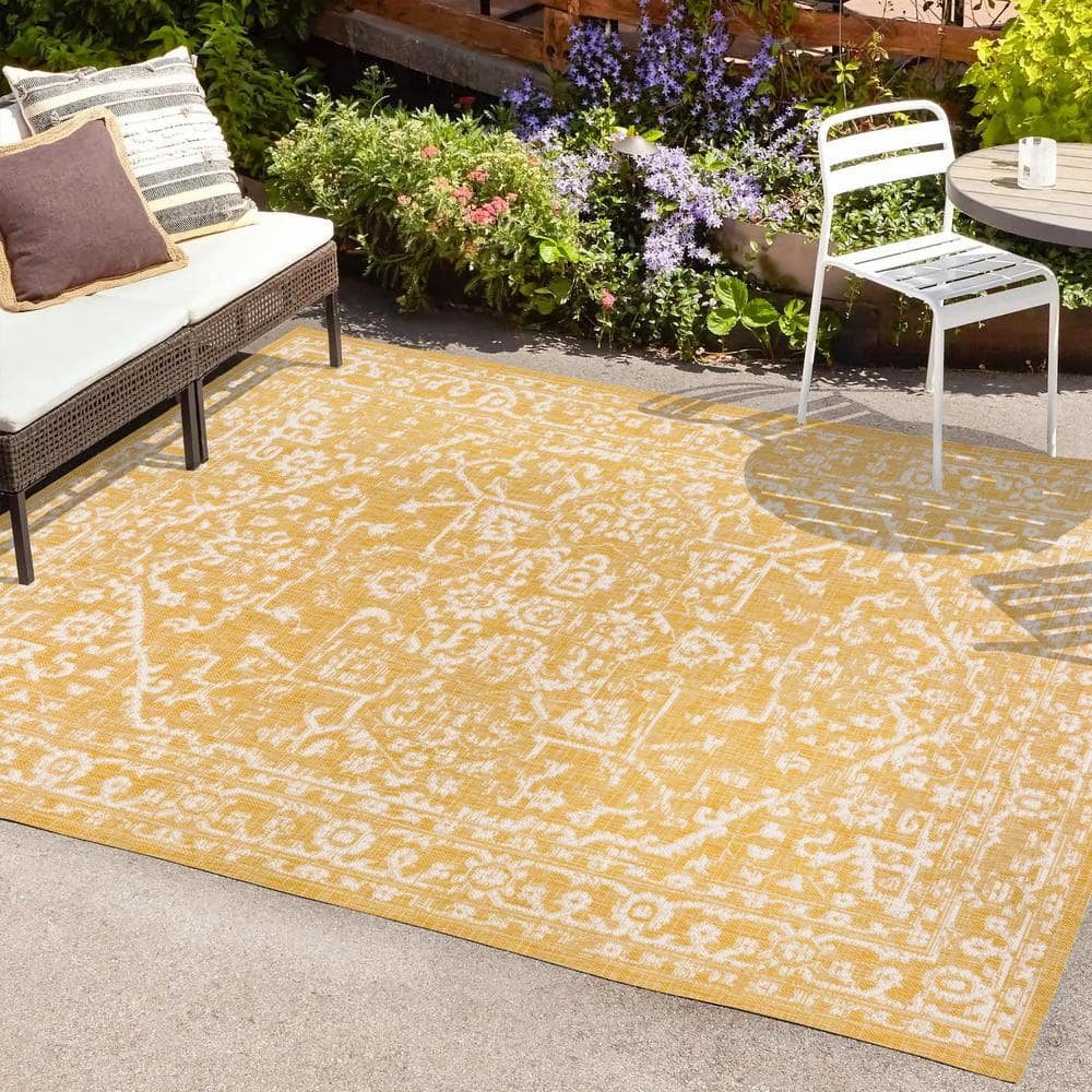 https://images.thdstatic.com/productImages/780f1525-1c13-413d-b4be-2d984ca2ea21/svn/yellow-cream-jonathan-y-outdoor-rugs-smb104g-8-64_1000.jpg
