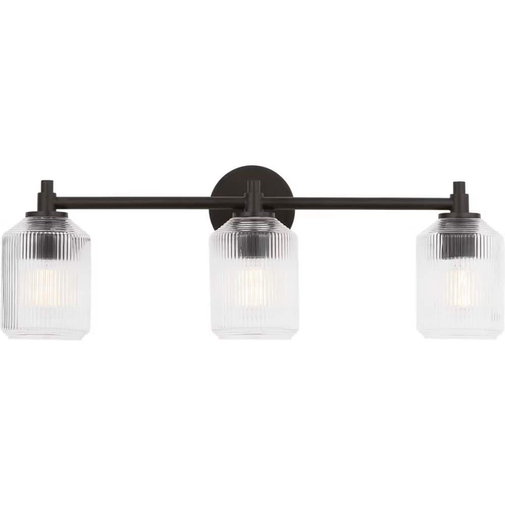 Barstow 25.5 in. W x 9 in. H 3-Light Aged Iron Traditional Bathroom Vanity Light with Clear Ribbed Glass Shades price history on PriceWatchPro