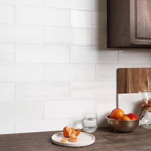 Bianco Dolomite White 4 in. x 12 in. Honed Marble Base Molding Wall Tile Trim