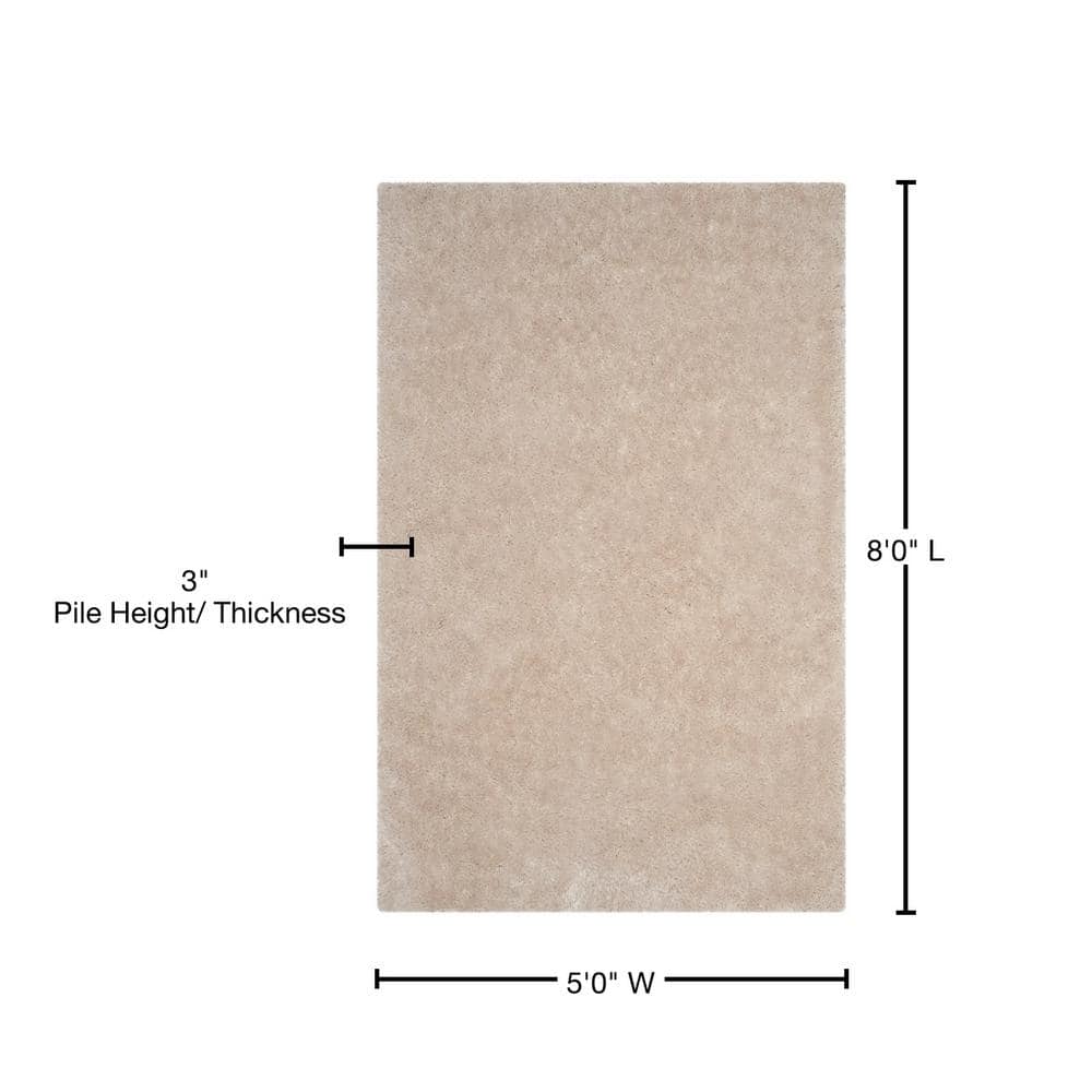 Ivory 5' x 8' Hand Tufted Shag Area Rug