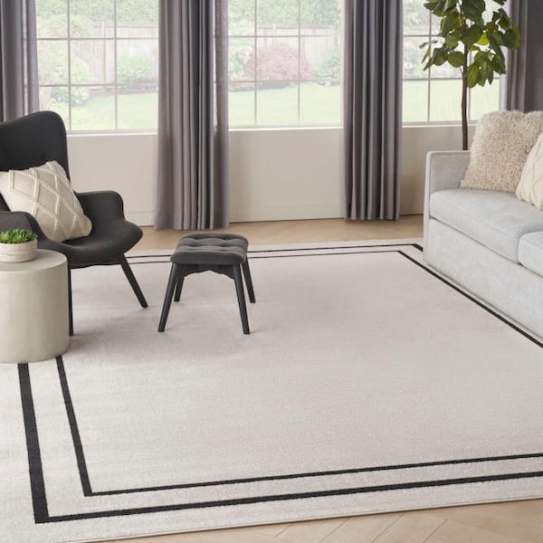 Essentials Ivory/Black 9 ft. x 12 ft. Solid Contemporary Indoor/Outdoor Area Rug