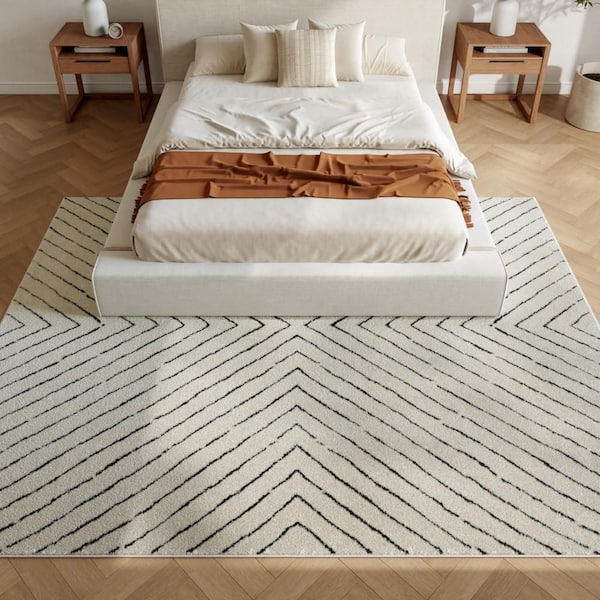 Cozy Modern Ivory Black 9 ft. x 12 ft. Abstract Contemporary Area Rug