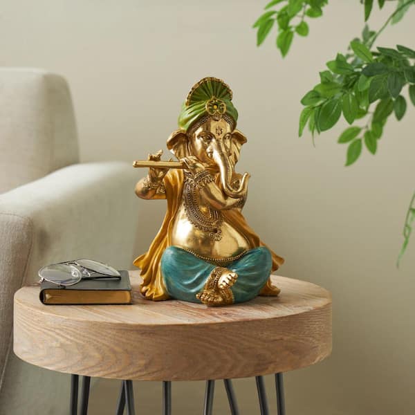 Litton Lane 9 in. x11 in. Gold Resin Musician Ganesh Sculpture with Green, Yellow, and Teal Accents