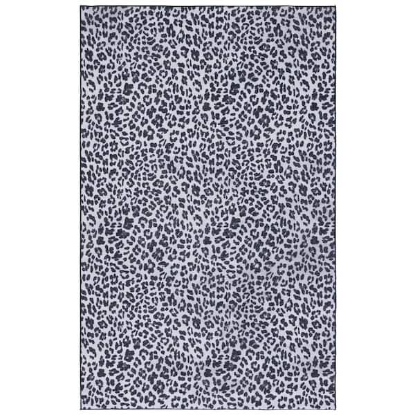 SAFAVIEH Faux Hide Ivory/Black Doormat 3 ft. x 5 ft. Machine Washable Animal Print Area Rug