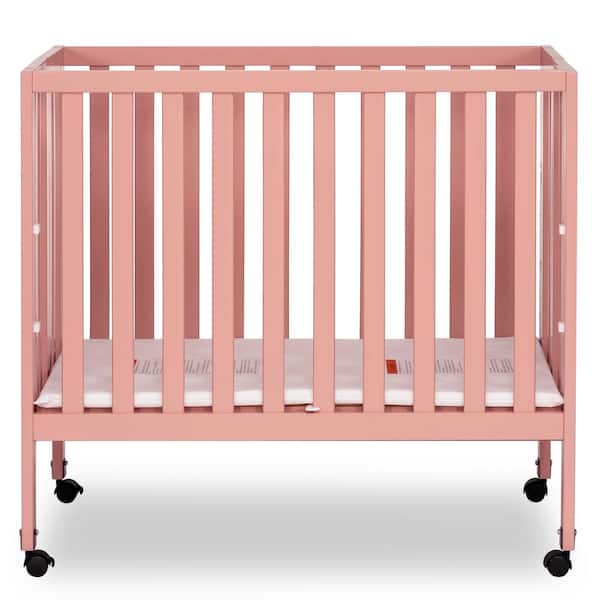 Dream On Me Jett Dusty Modern Nursey Adjustable Mattress Support Included 1.5 in. Mattress Pink Non-Full Size Folding Crib