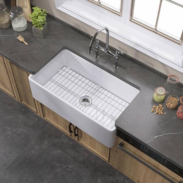 https://images.thdstatic.com/productImages/788f3c88-3104-47e2-a46a-85d7513d188f/svn/gloss-white-zeafive-farmhouse-kitchen-sinks-zfc3318-w1-c3_600.jpg