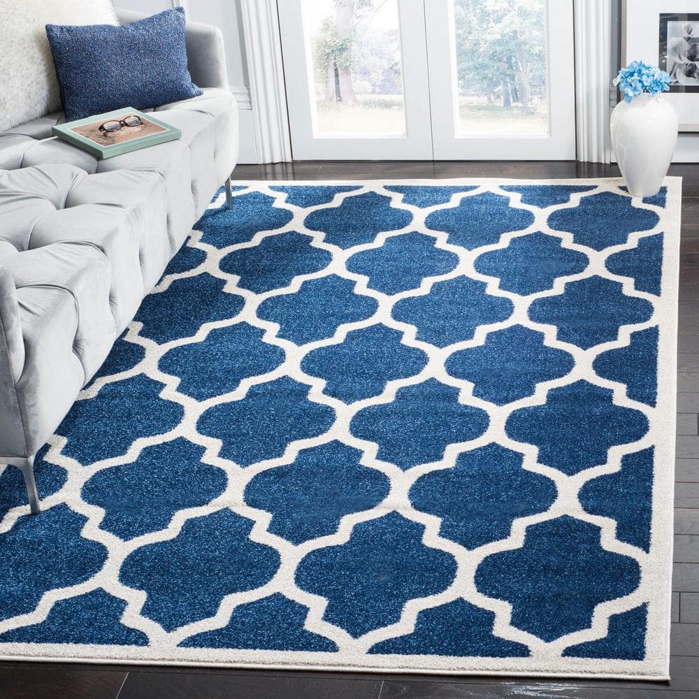 Reversible Geometric Navy and Beige 5' x 8' Synthetic Area Rug
