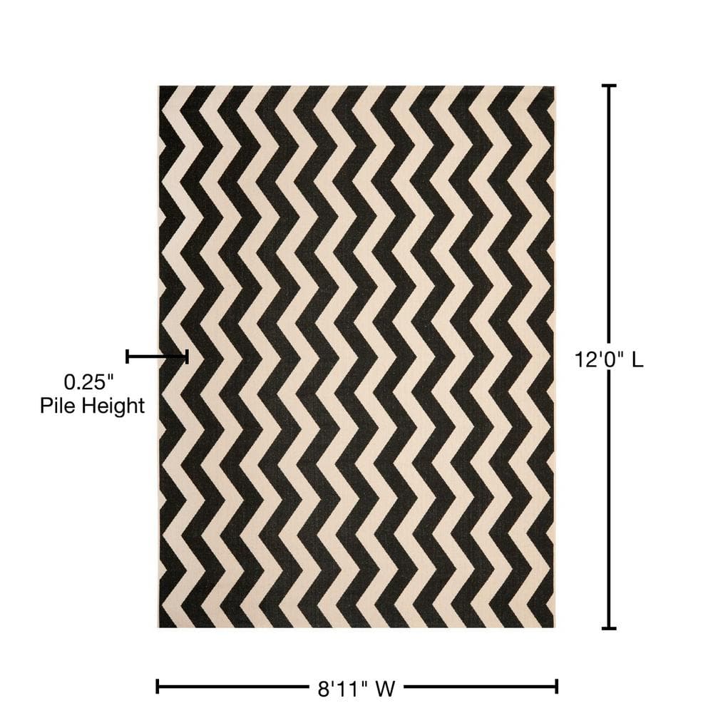 Courtyard Collection 54" Round Black/Beige Synthetic Area Rug