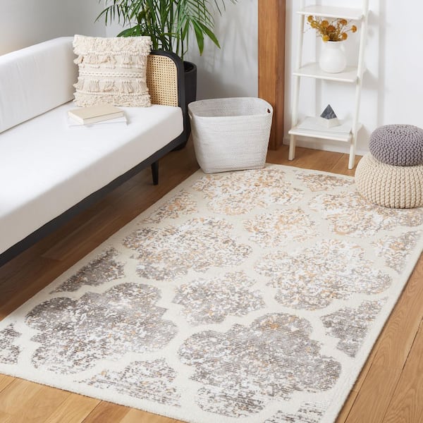 Artistry 4 ft. x 6 ft. Ivory/Gold Quatrefoil Geometric Area Rug