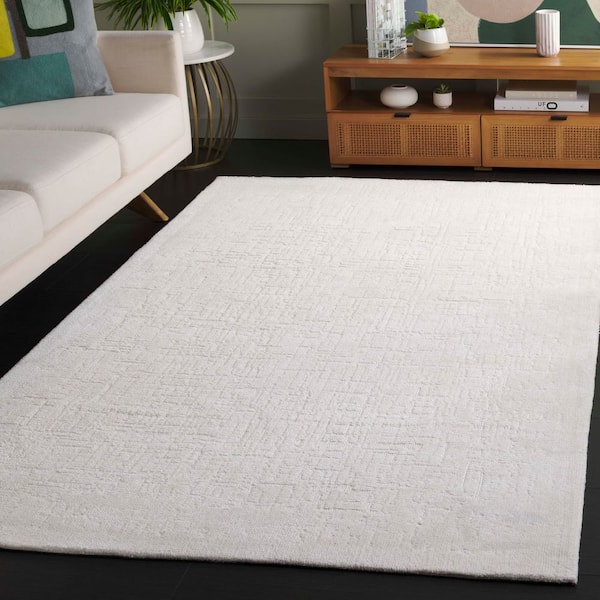 Audrey 5 ft. x 7 ft. Ivory Solid Abstract Area Rug