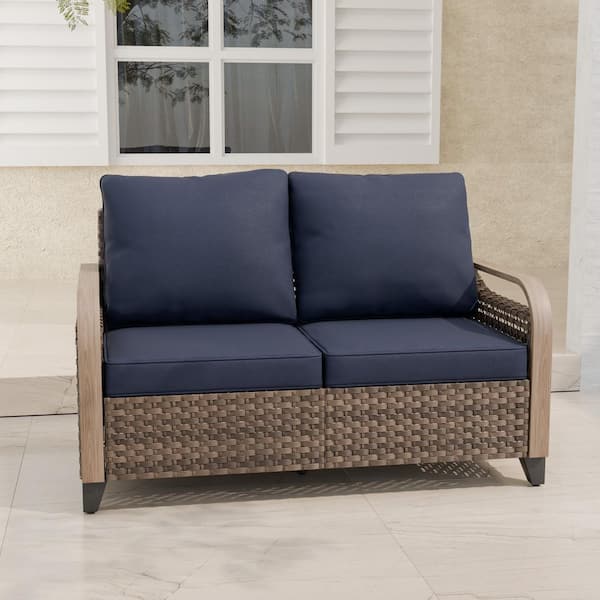 Brown Wicker Outdoor Patio Loveseat with Blue Cushions