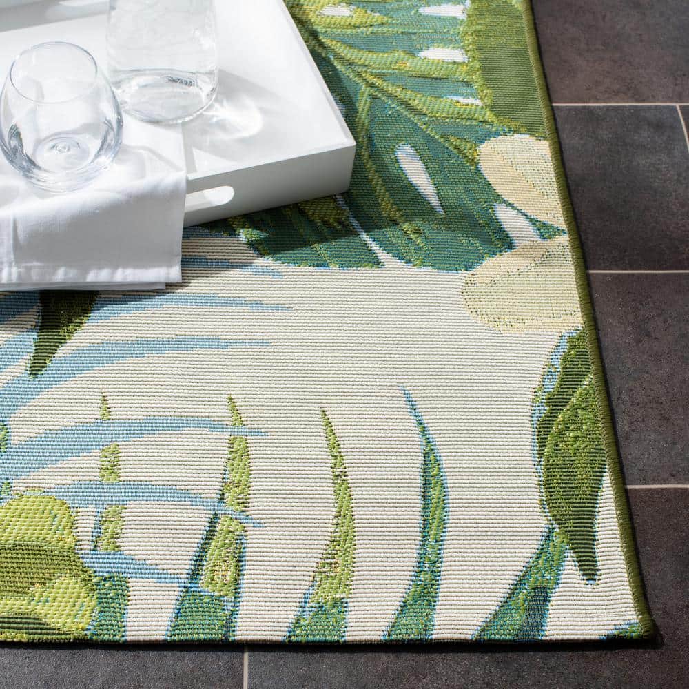 Green and Pink Tropical Floral Synthetic Outdoor Rug, 5'3" x 7'6"