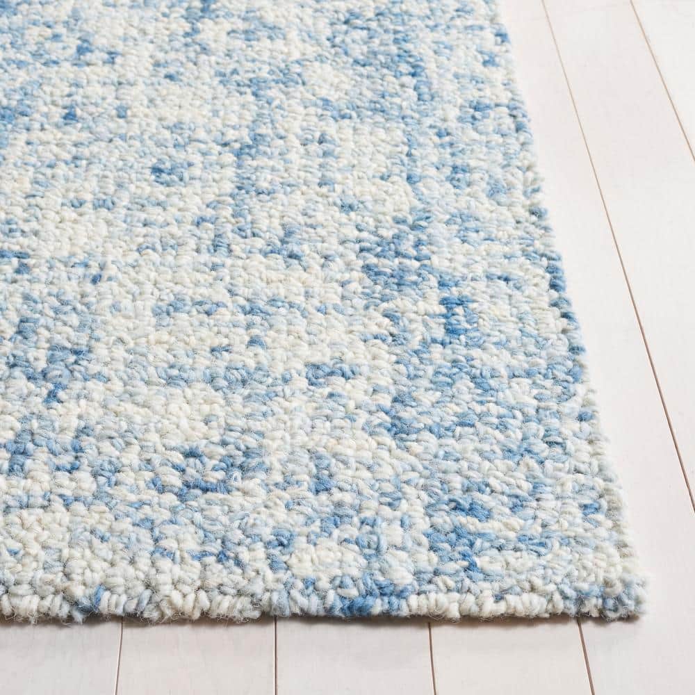 Handmade Blue and Ivory Wool Abstract Tufted Rug, 4' x 6'