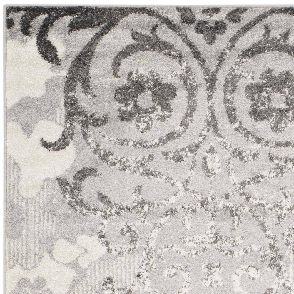 Silver and Ivory Floral Reversible 4' x 6' Synthetic Rug