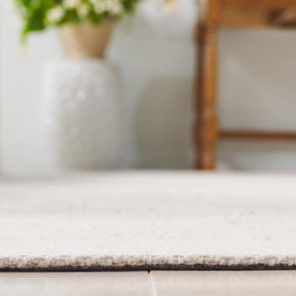 Beige Ivory Tufted Handmade Wool Area Rug 5' x 8'