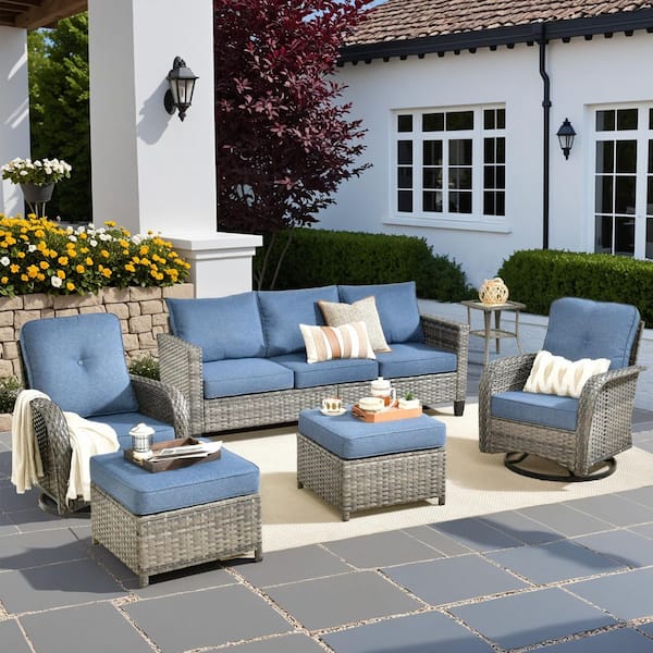 Audrey Gray 6-Piece Wicker Outdoor Patio Conversation Set With Rocking Swivel Chairs and Denim Blue Cushions.